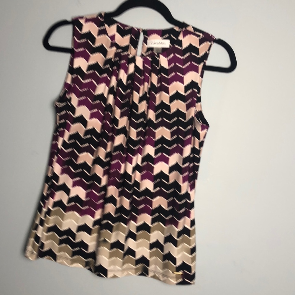 Calvin Klein pleated Round neckline.